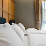 Brown Dot Hotel Signature
